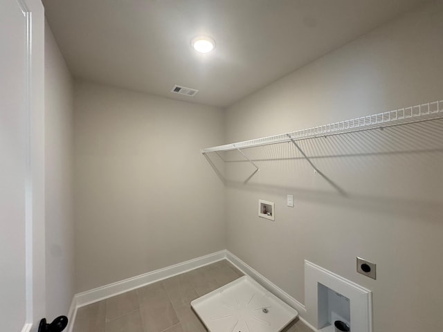 laundry room with washer hookup and electric dryer hookup