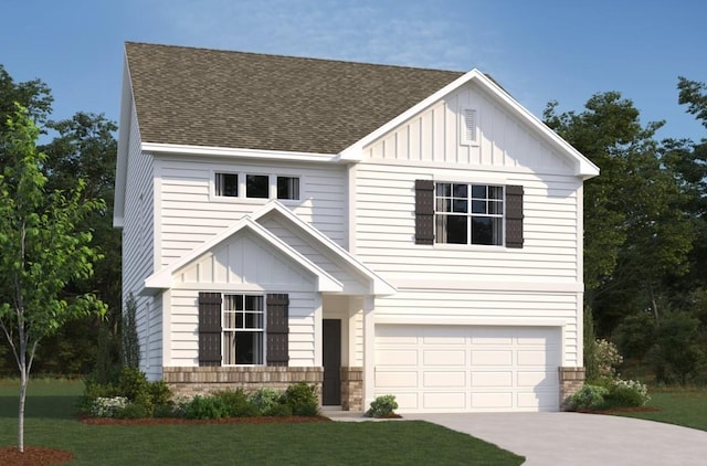 view of front of house featuring a garage and a front yard