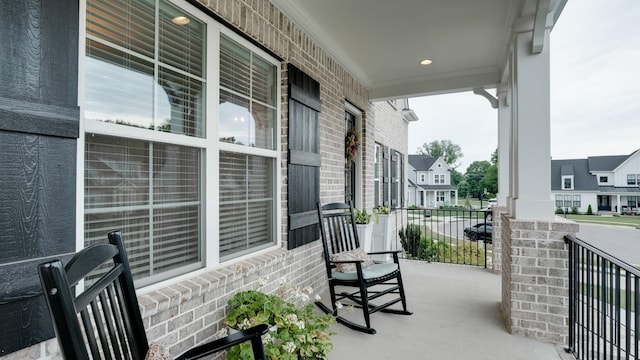 balcony featuring a porch