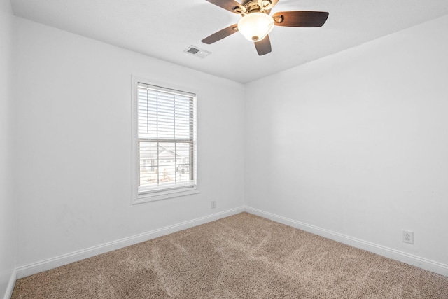 carpeted empty room with ceiling fan