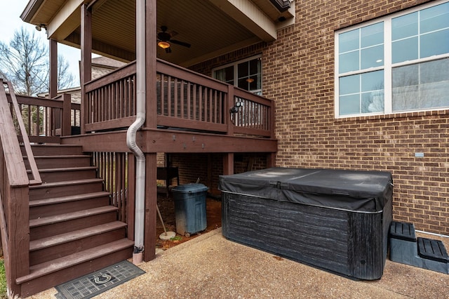 exterior space featuring ceiling fan