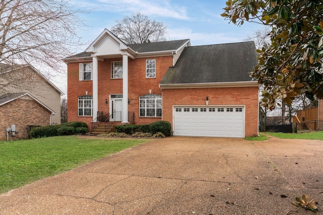 neoclassical home with a garage and a front yard