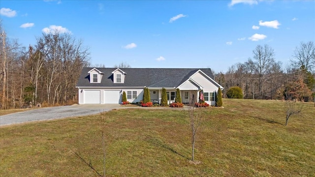 view of front of property with a garage, covered porch, and a front lawn