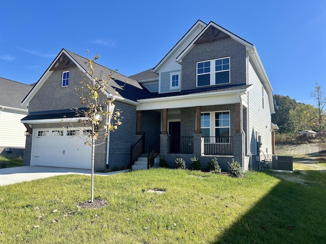 craftsman-style home featuring central AC, a front yard, and covered porch