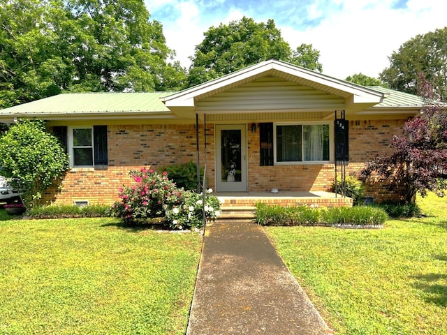 124 Cline Cir, Dunlap, TN 37327 - ranch-style home with a front lawn, brick siding, crawl space, metal roof, and a porch
