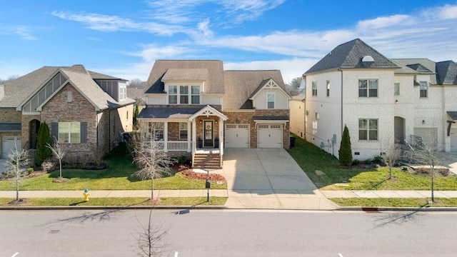 view of front of house with a garage, a porch, and a front yard