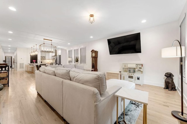 living room with light wood-type flooring