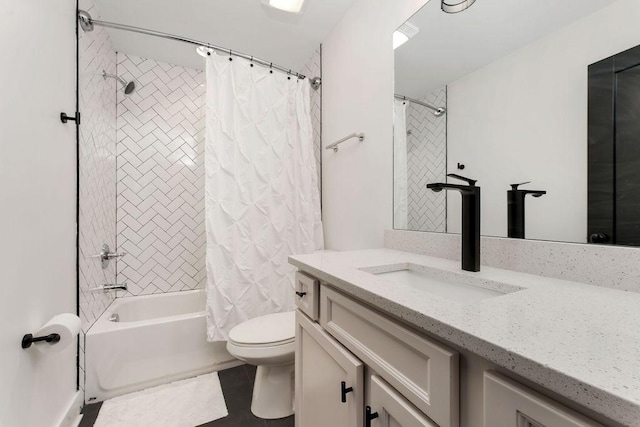 full bathroom with vanity, shower / bath combination with curtain, tile patterned floors, and toilet