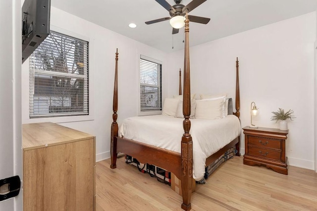 bedroom featuring ceiling fan and light wood-type flooring