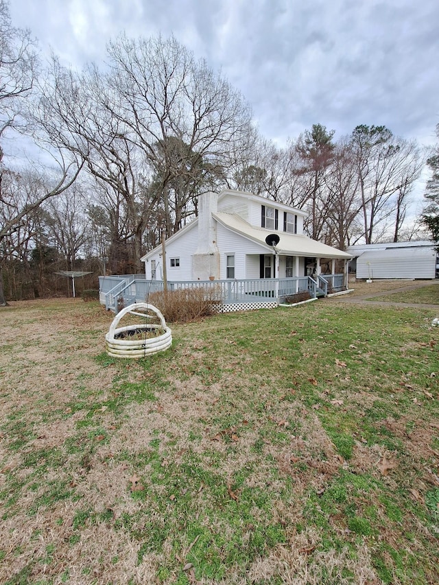 view of yard with a porch