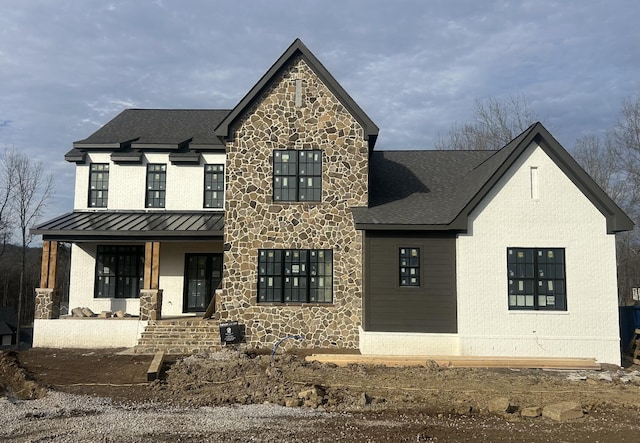 view of front of home with covered porch