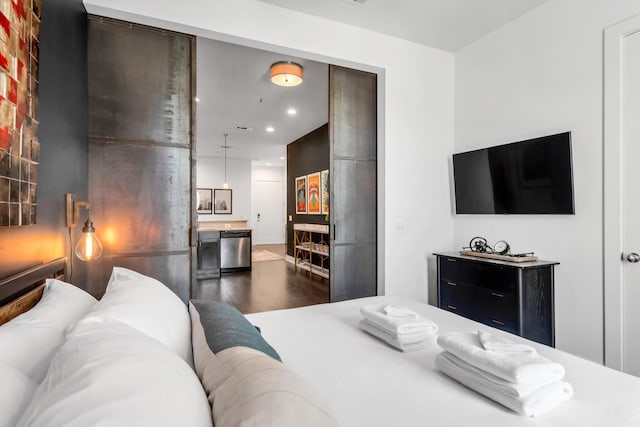 bedroom featuring dark hardwood / wood-style flooring