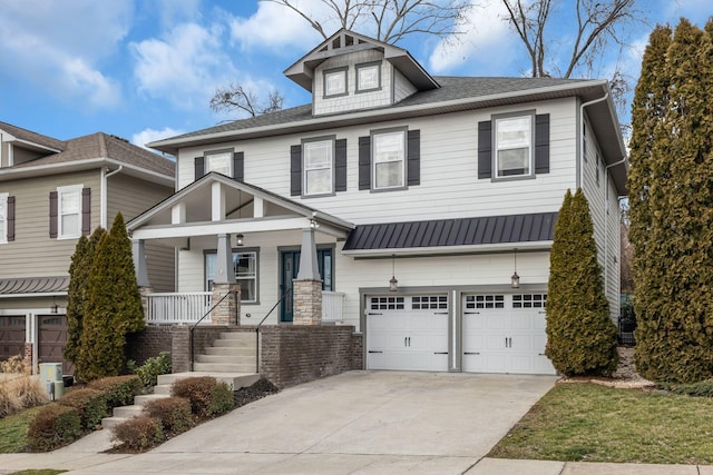 view of front of home featuring a garage and covered porch