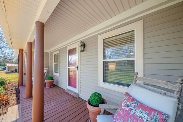 wooden deck featuring a porch