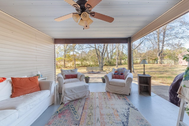 exterior space with ceiling fan