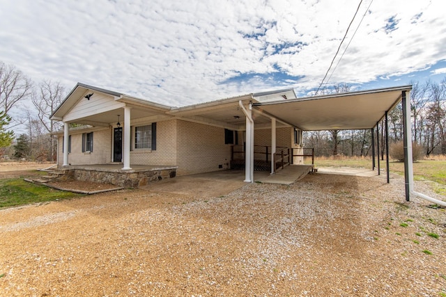 view of front facade with a carport