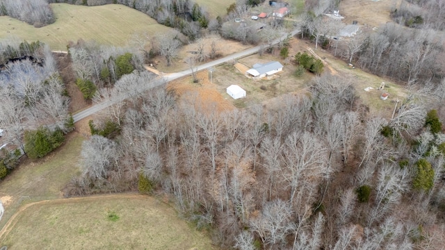 birds eye view of property featuring a rural view