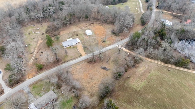 birds eye view of property featuring a rural view