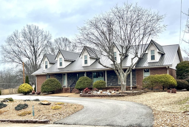 view of new england style home