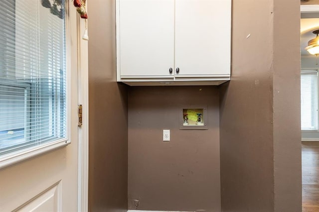 2958 Millers Pond Dr, Memphis, TN 38119 - laundry room featuring cabinets, wood-type flooring, and washer hookup