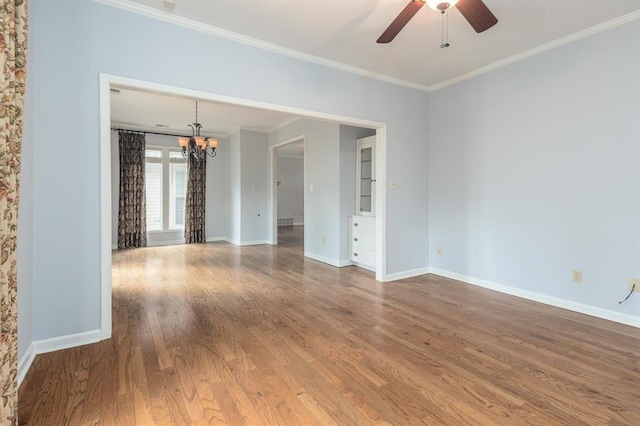 2958 Millers Pond Dr, Memphis, TN 38119 - spare room featuring hardwood / wood-style flooring, ceiling fan with notable chandelier, and ornamental molding