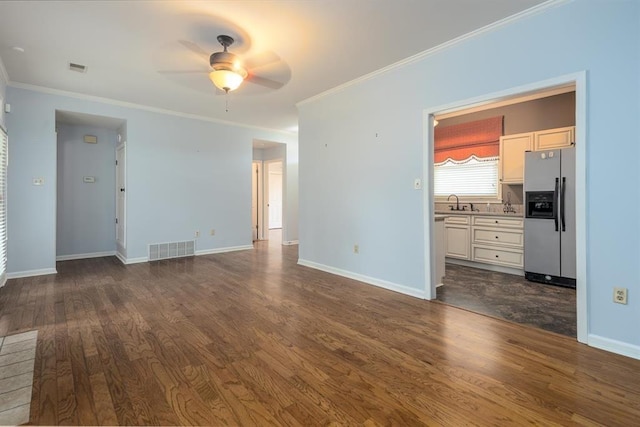 2958 Millers Pond Dr, Memphis, TN 38119 - unfurnished living room featuring crown molding, ceiling fan, dark hardwood / wood-style flooring, and sink