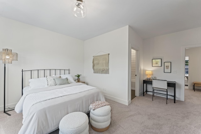 bedroom featuring light carpet