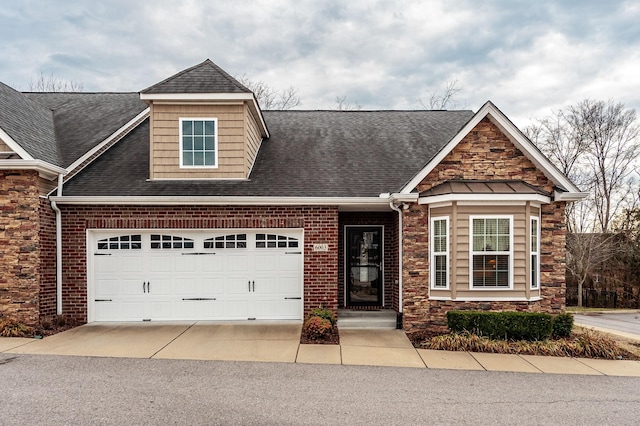 craftsman house with a garage