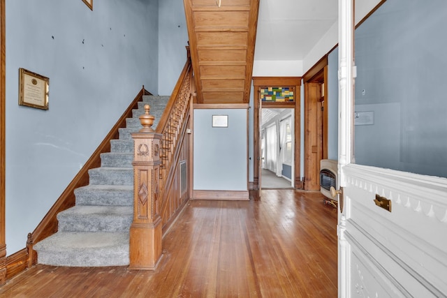 entryway featuring hardwood / wood-style flooring and heating unit