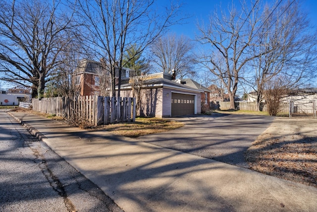 view of home's exterior with a garage