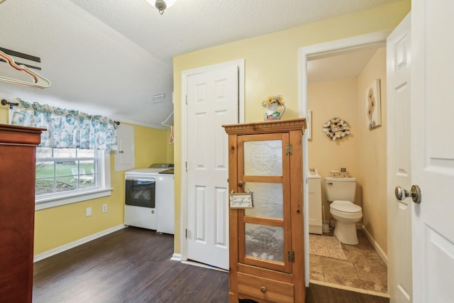 479 Elora Rd, Elora, TN 37328 - bathroom with washer and dryer, toilet, wood finished floors, baseboards, and electric panel