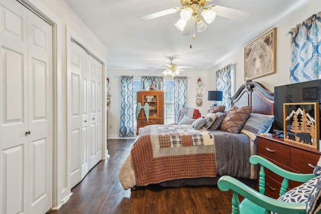 479 Elora Rd, Elora, TN 37328 - bedroom featuring dark wood finished floors, two closets, a ceiling fan, and baseboards