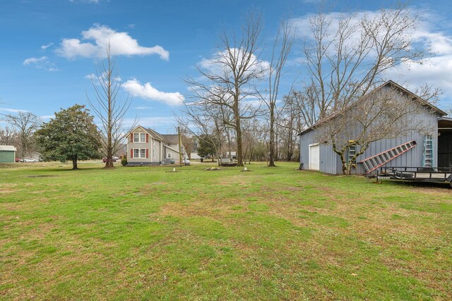479 Elora Rd, Elora, TN 37328 - view of green lawn featuring an outbuilding