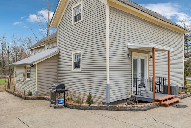 479 Elora Rd, Elora, TN 37328 - view of property exterior with french doors, central air condition unit, and a patio area