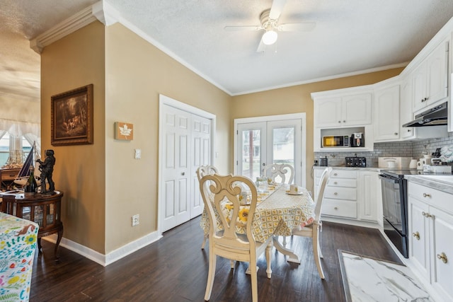 479 Elora Rd, Elora, TN 37328 - dining area with crown molding, ceiling fan, dark wood-style floors, french doors, and baseboards
