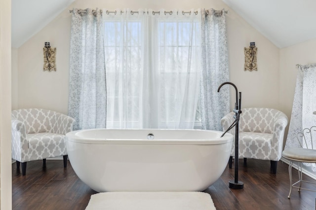 479 Elora Rd, Elora, TN 37328 - full bath with vaulted ceiling, wood finished floors, and a freestanding tub
