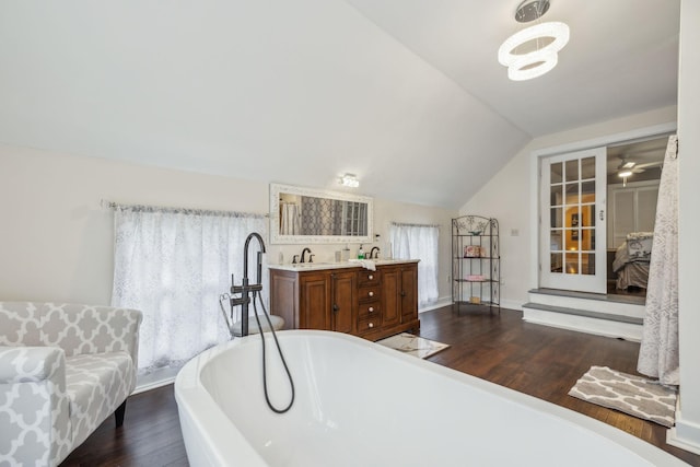 479 Elora Rd, Elora, TN 37328 - bedroom featuring lofted ceiling, dark wood-style floors, and a sink