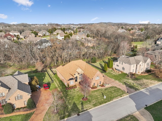 birds eye view of property with a residential view