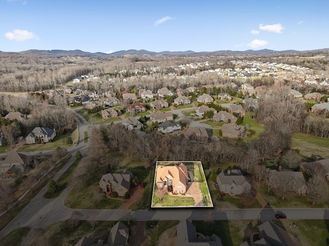 bird's eye view featuring a residential view and a mountain view