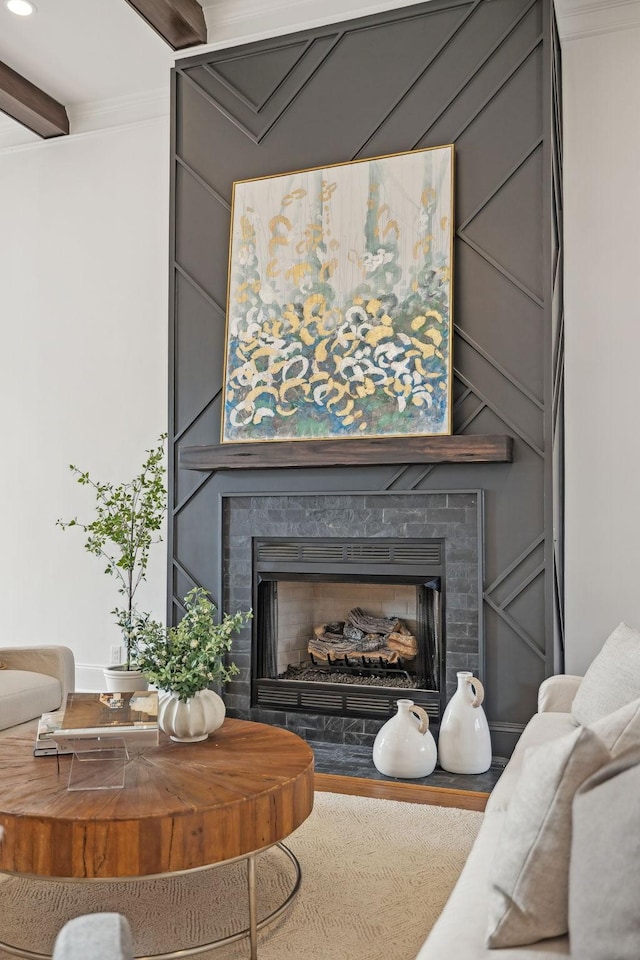 interior space featuring ornamental molding and a fireplace