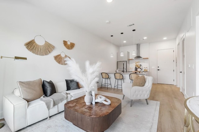 living room featuring light wood-type flooring