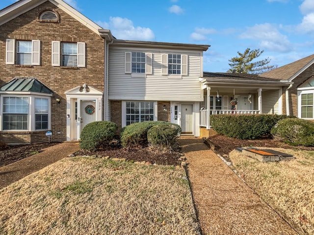 view of front of property with a front lawn