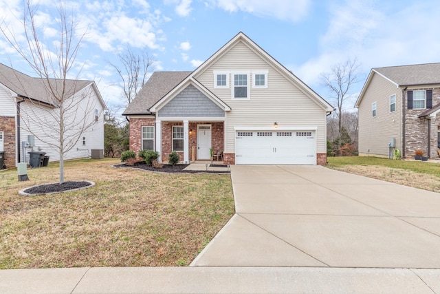 view of front of house featuring central AC unit, a garage, and a front lawn