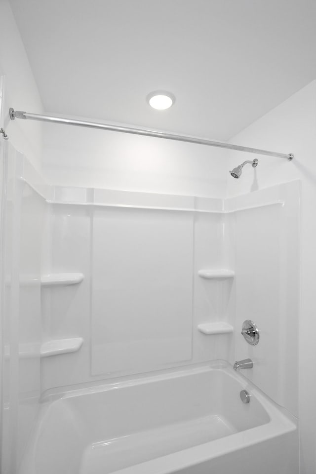 bathroom with shower / tub combination