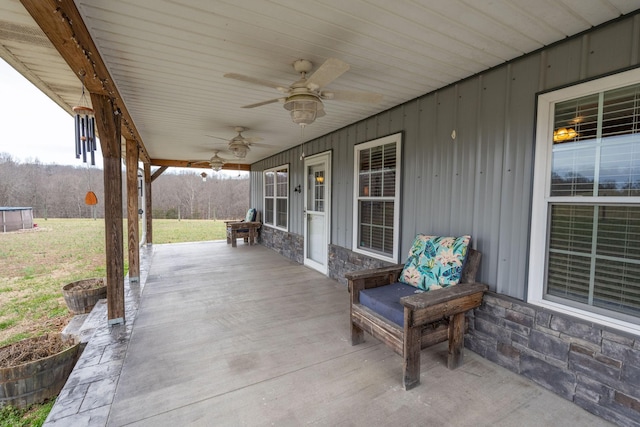 view of patio / terrace featuring ceiling fan