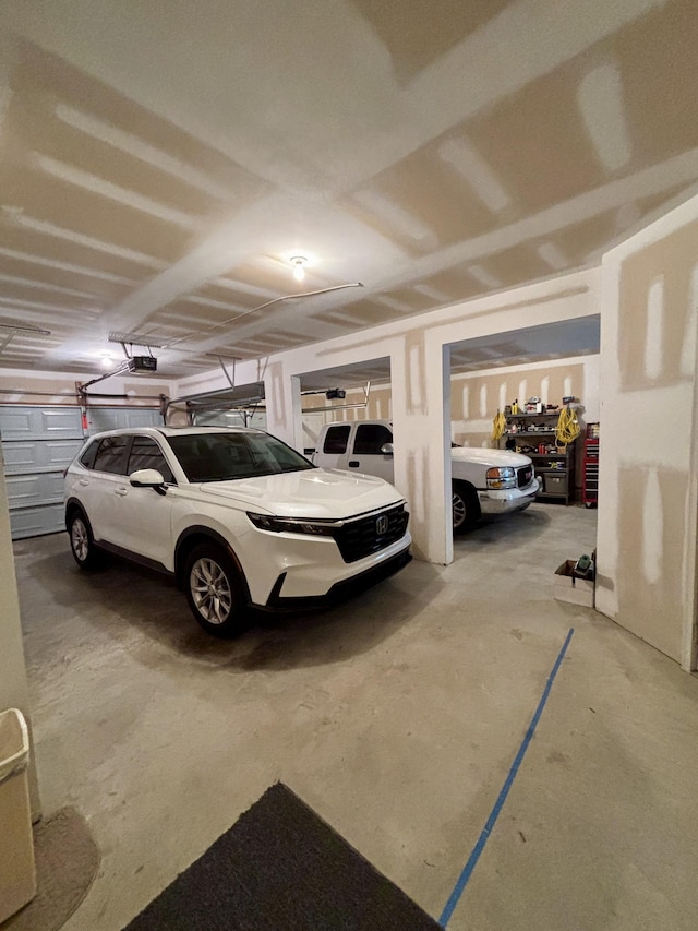 1532 Bunbury Dr, Thompsons Station, TN 37179 - parking garage with a garage door opener