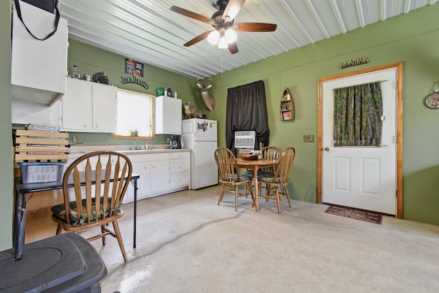 474 Bartlett Hollow Rd, Petersburg, TN 37144 - kitchen featuring freestanding refrigerator, a ceiling fan, a sink, and white cabinets