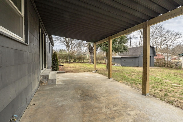 view of patio with a storage shed