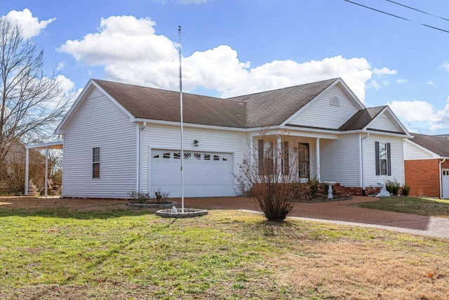 ranch-style house featuring a garage and a front lawn