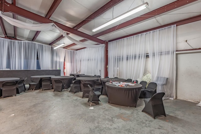 interior space featuring a garage and concrete floors